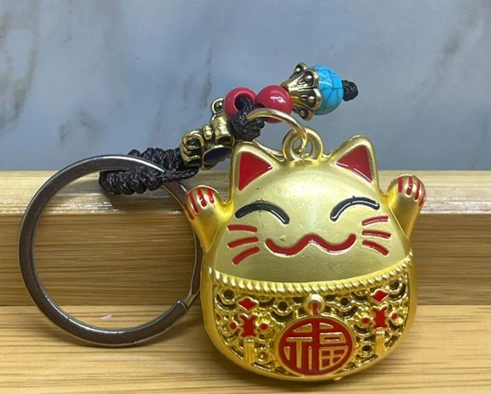 Metal Sans ve Bereket Figurleri Anahtarlik - TrendTrove