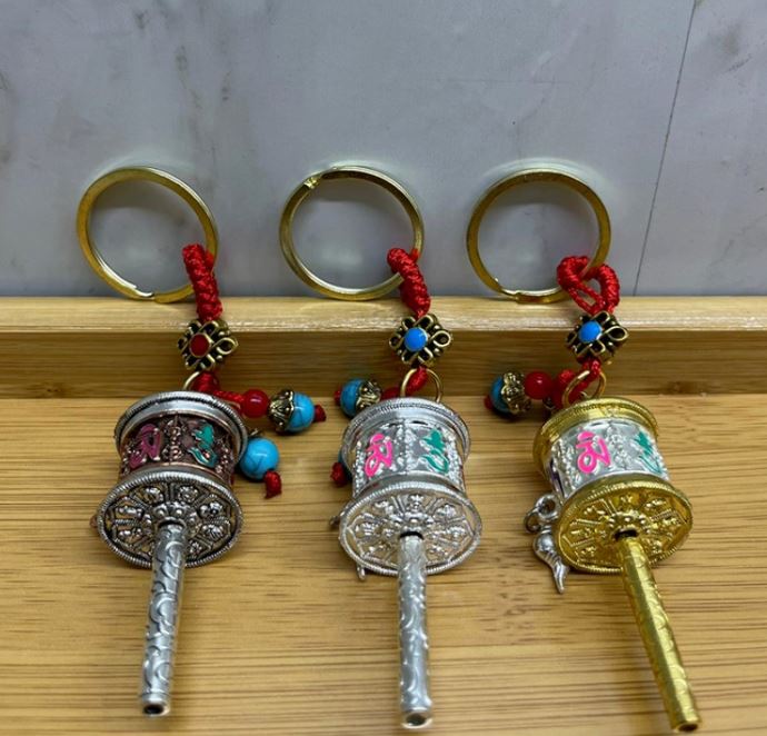 Metal Sans ve Bereket Figurleri Anahtarlik - TrendTrove